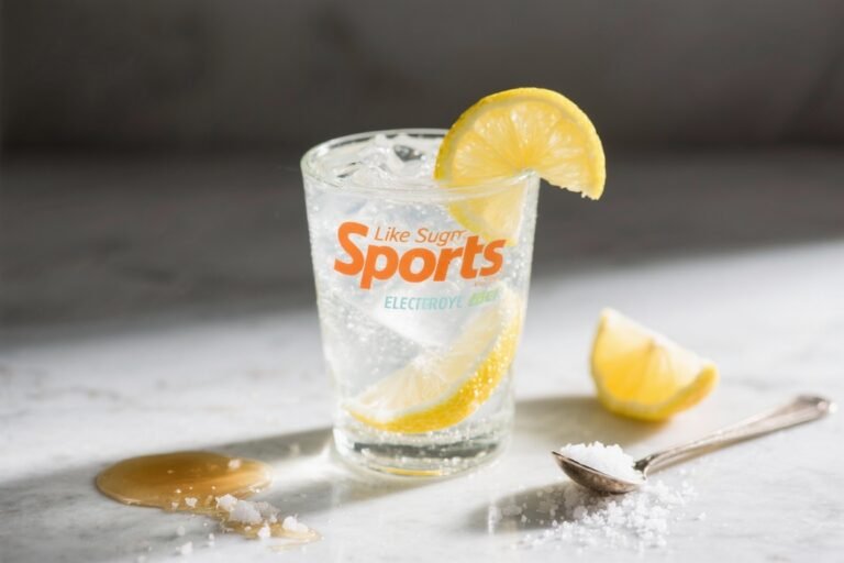 Like Sugary Sports Drinks, But Better – Homemade Electrolyte Drink: Water, a squeeze of citrus, and a pinch of salt/maple syrup for natural hydration after activity that actually works